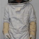 Cap, veil, gloves and beekeeping suit