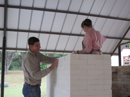 Laying bricks from inside and outside